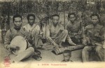L to R; another raised fret instrument is the Dan Nguyet (in the south called Dan Kim), a bowed Dan Nhi, the Vietnamese zither called Dan Tranh, I can't quite make out the next fiddle, but I think it's a Dan Gao, and finally the Dan Tam, related to the Chinese sanxian.